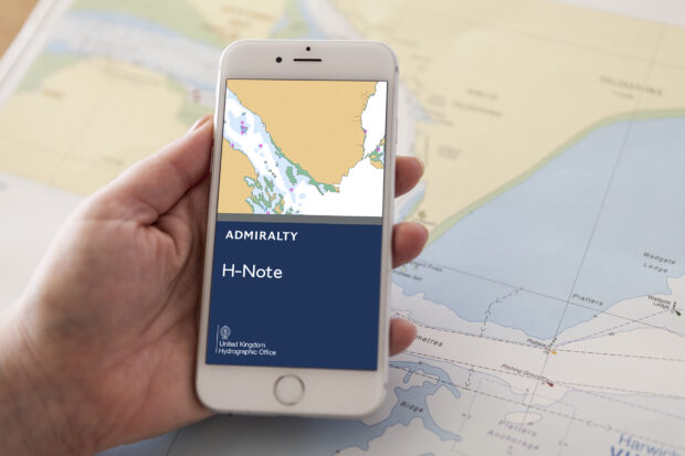 The ADMIRALTY H-Note App being displayed on a smartphone