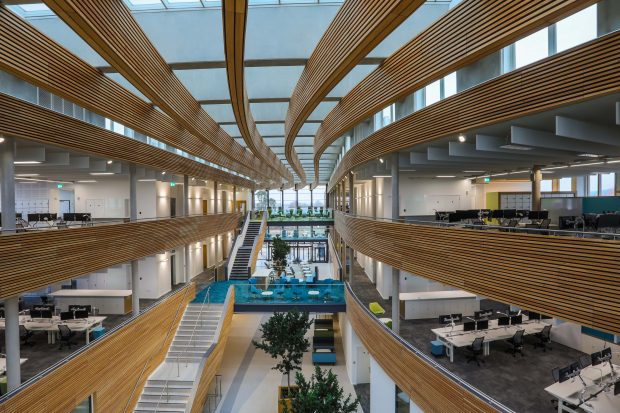 The interior of the UK Hydrographic Office's new building, showing the atrium, two floors and connecting bridges
