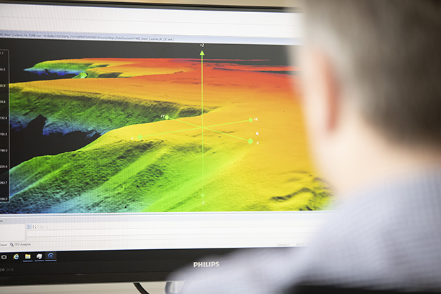 UKHO staff analysing coastal seabed mapping data