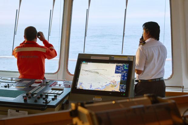 Two mariners on the bridge of a ship