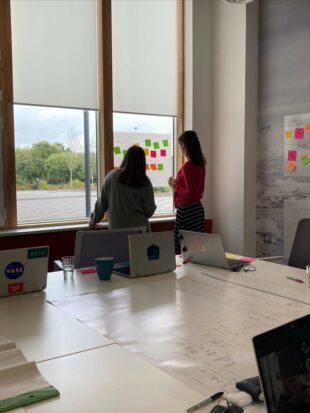 Two members of UKHO staff in design sprint